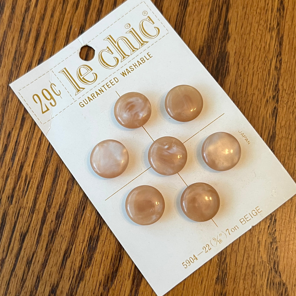 1970’s Le Chic Beige Plastic Shank Buttons - Opalescent - Set of 7 - Size 22 - 9/16" - on card