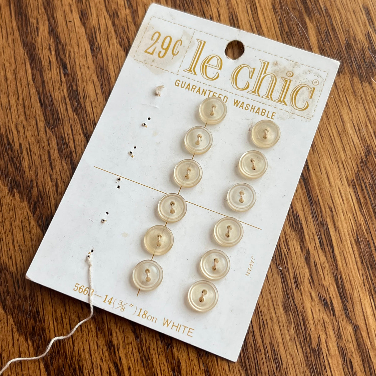 1960’s Le Chic Plastic Buttons - White - Set of 12 - Size 18 - 3/8" - on card