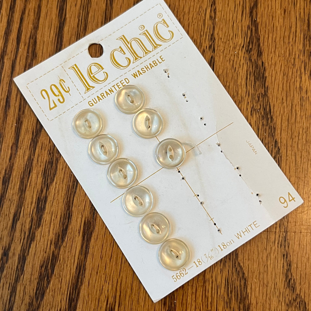 1970’s Le Chic White Plastic Buttons - Opalescent - Set of 9 - Size 18 - 7/16" - on card