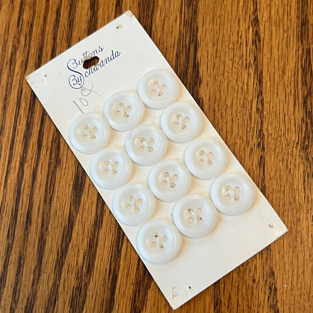 1960’s Buttons by Schwanda Plastic Buttons - White - Set of 12 - Size 24 - 9/16" - on card