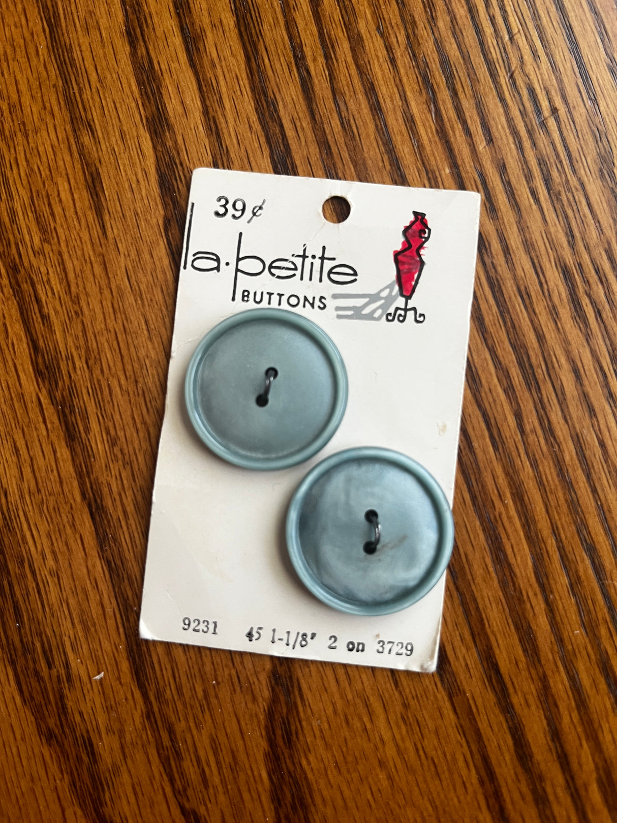 1980’s La Petite Dusty Blue Carved Plastic Buttons - Set of 2 - 1 1/8” - on card