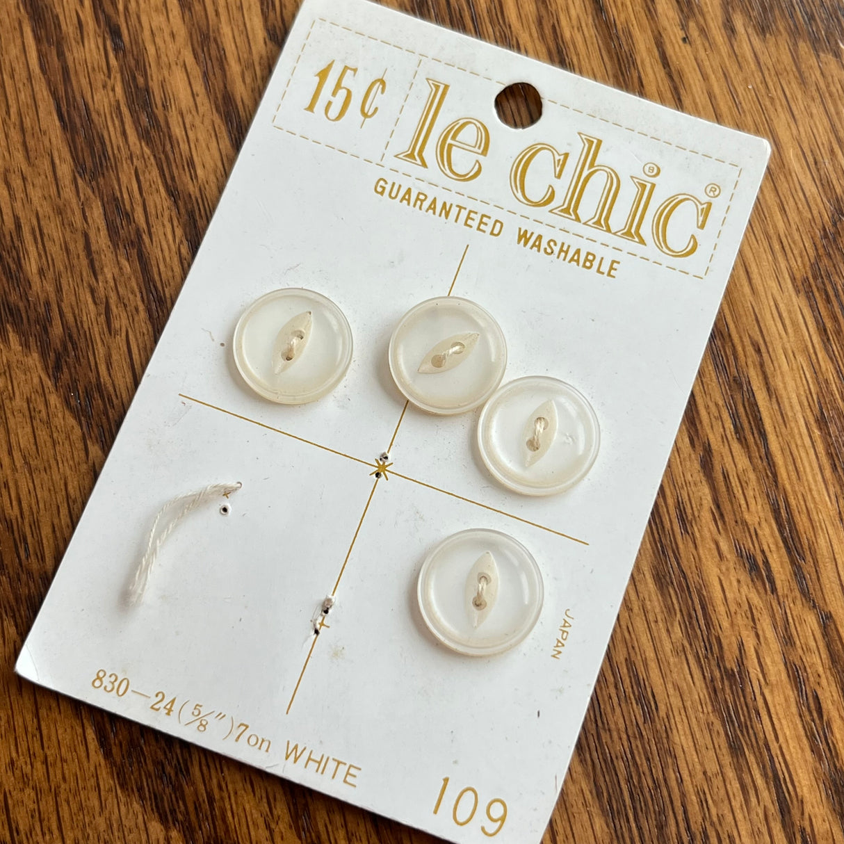 1960’s Le Chic Plastic Buttons - Pearlescent White - Set of 4 - 5/8" - on card