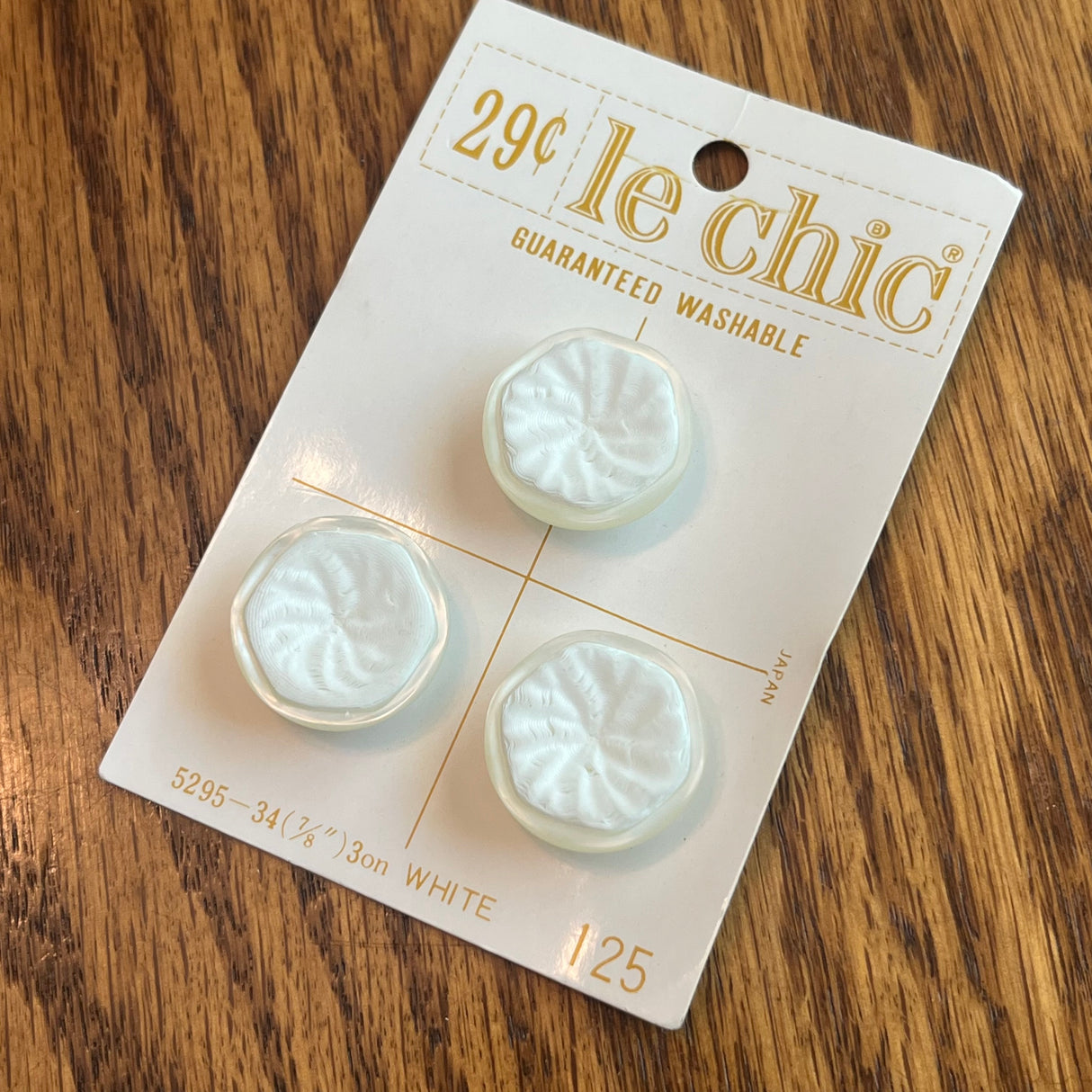 1960’s Le Chic Plastic Buttons - Cream and White - Set of 3 - 7/8" - on card