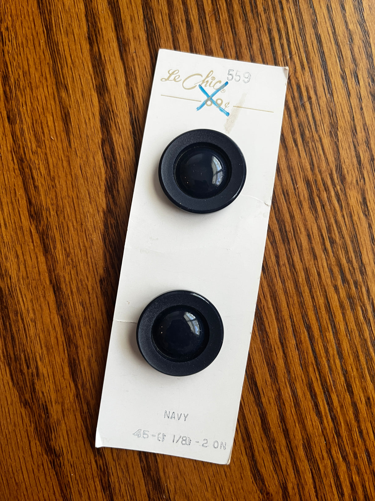 1970’s Le Chic Deep Navy Blue Plastic Shank Buttons - 1 1/8” - set of 2 - on card