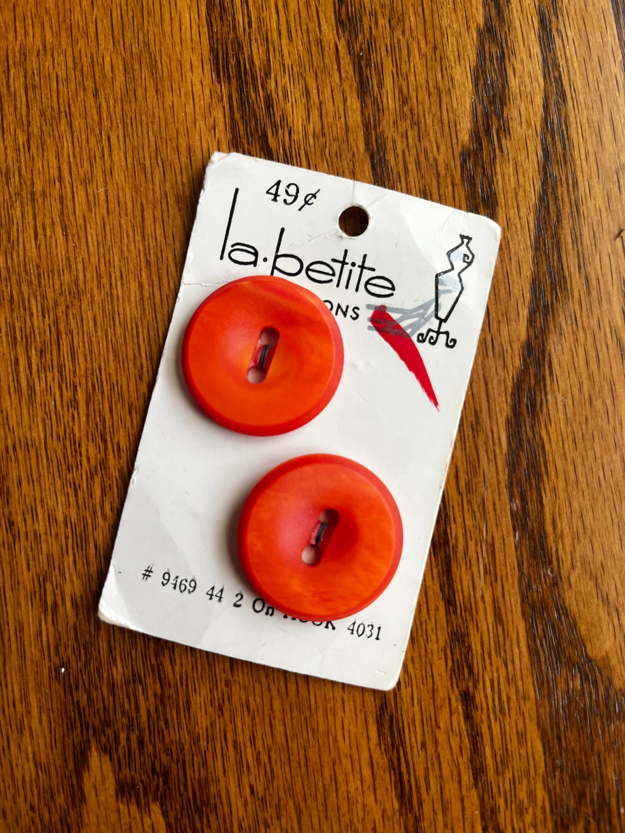 1970’s La Petite Large Matte Orange Plastic Buttons - Set of 2 - 1 1/8” - on card