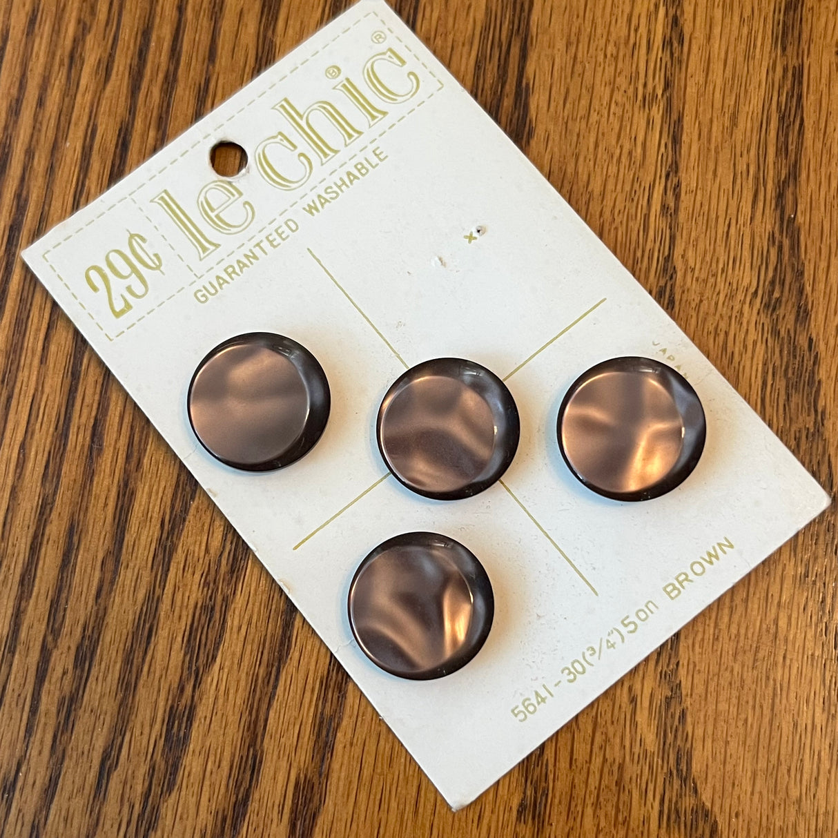1970’s Le Chic Brown Plastic Shank Buttons - Set of 4 - 3/4" - on card