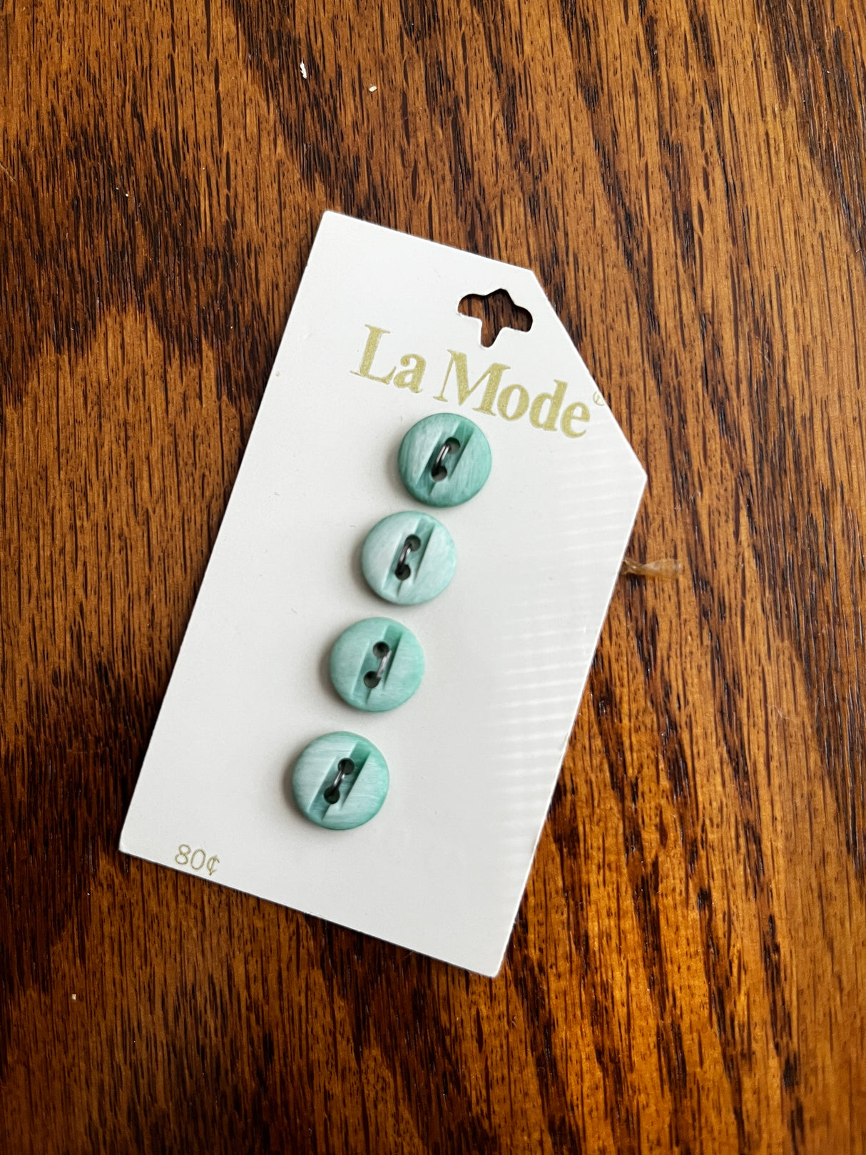 1980’s La Mode Blue Green Carved Plastic Buttons - Set of 4 - 7/16" - on card