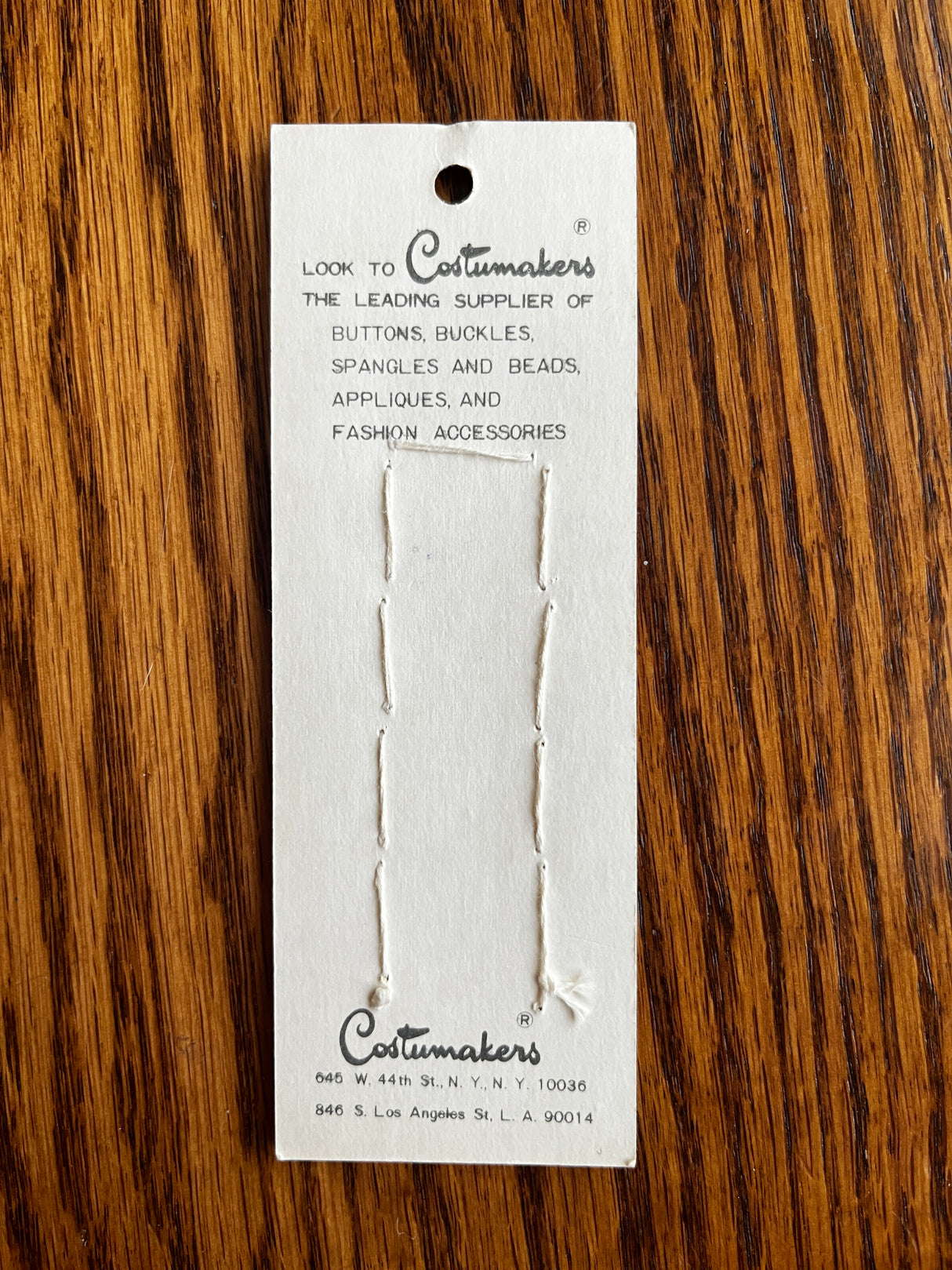 1970’s Costumakers White Pearlescent Plastic Buttons - 1/4” - on card