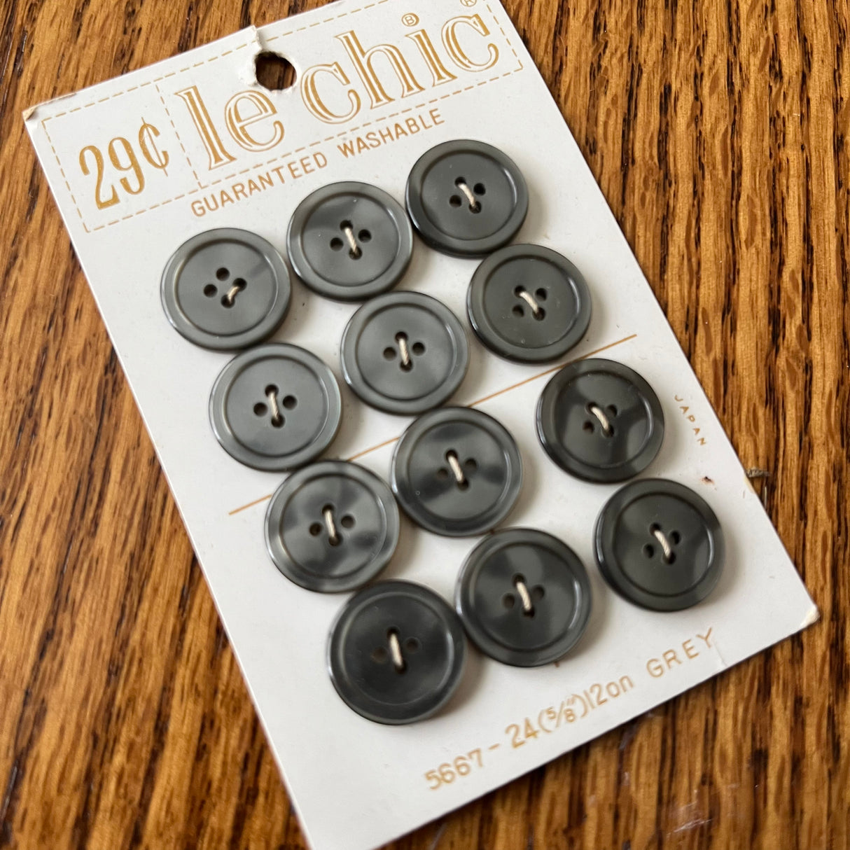 1970’s Le Chic Plastic Buttons - Grey - Set of 12 - Size 24 - 5/8" - on card