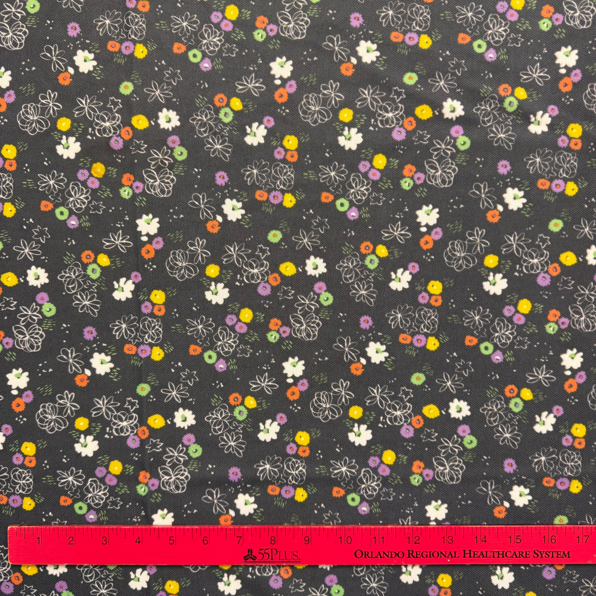 1970’s Black with multicolor flowers polyester fabric (P101)