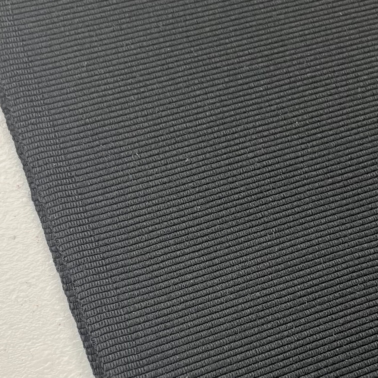 1970's Blacked Ribbed Synthetic Fabric- BTY (S31)