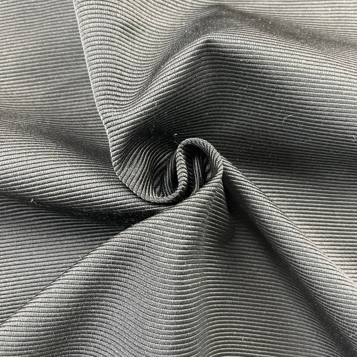 1970's Blacked Ribbed Synthetic Fabric- BTY (S31)