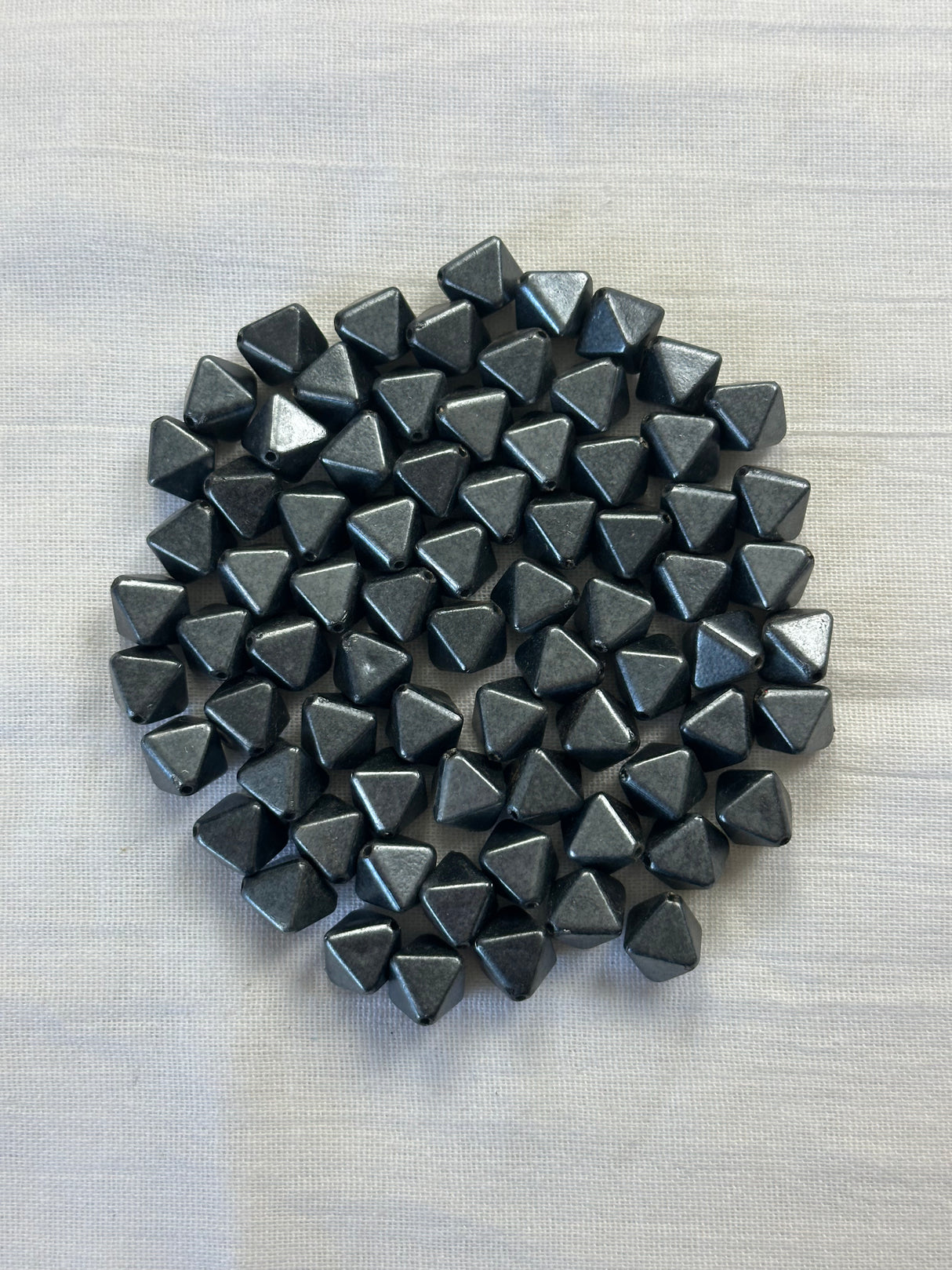 1980’s Gunmetal Grey Pearlescent Plastic Faceted Bicone beads