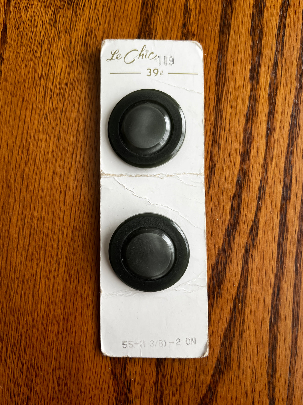 1970’s Le Chic Dark Grey Plastic Shank Buttons - set of 2 - on card