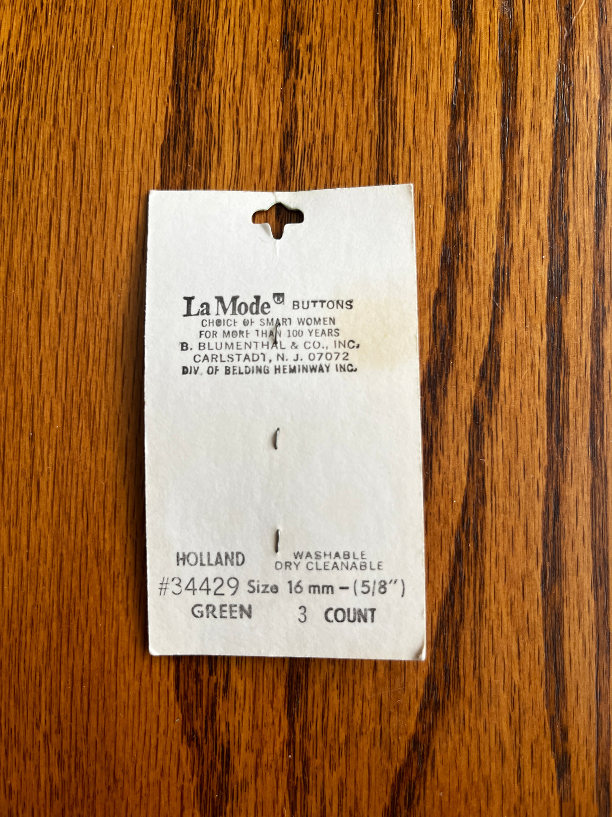 1970’s La Mode Forest Green Carved Plastic Buttons - on card