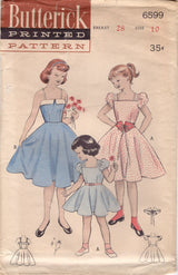 1950's Butterick Child's Fit and Flare Dress Pattern with Puff Sleeves and Belt - Chest 28" - No. 6599