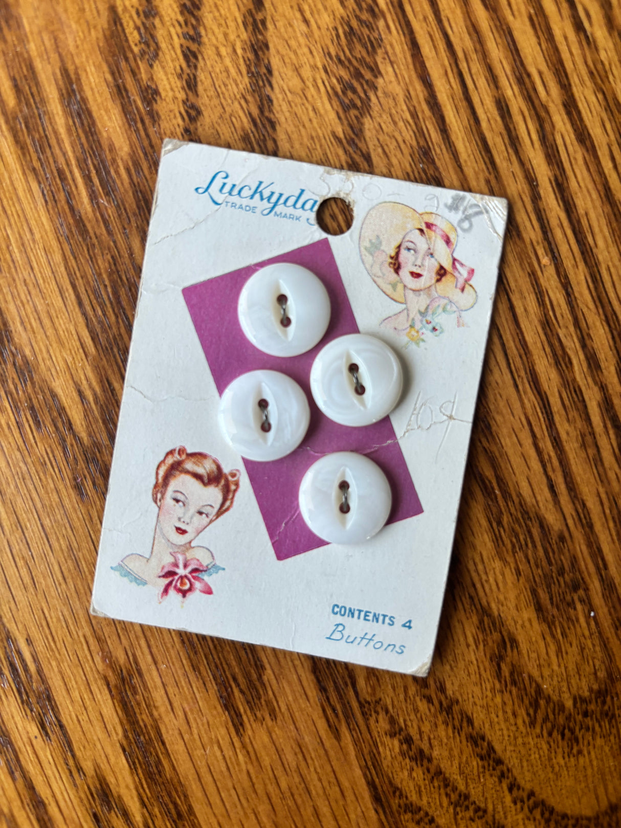 1940’s Lucky Day Pearl Buttons - Opaque - Set of 4 - 5/8" -  on card (50AB)