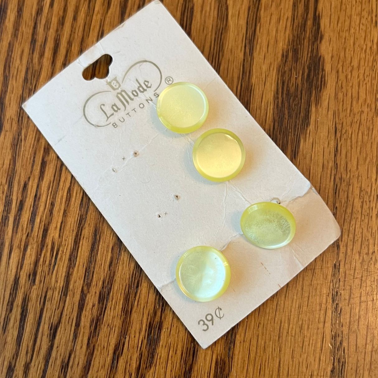 1970’s La Mode Yellow Plastic Shank Buttons - Opalescent - Set of 4 - Size 22 - 9/16" -  on card