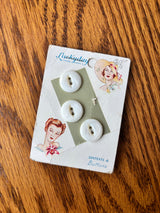 1940’s Lucky Day Pearl Buttons - Opaque - Set of 4 - 5/8" -  on card (#51)