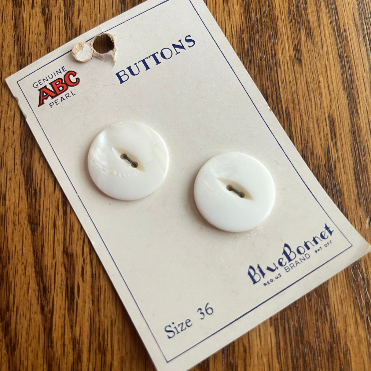 1950’s Blue Bonnet ABC Pearl Buttons - White - Size 36 - 7/8" - on card