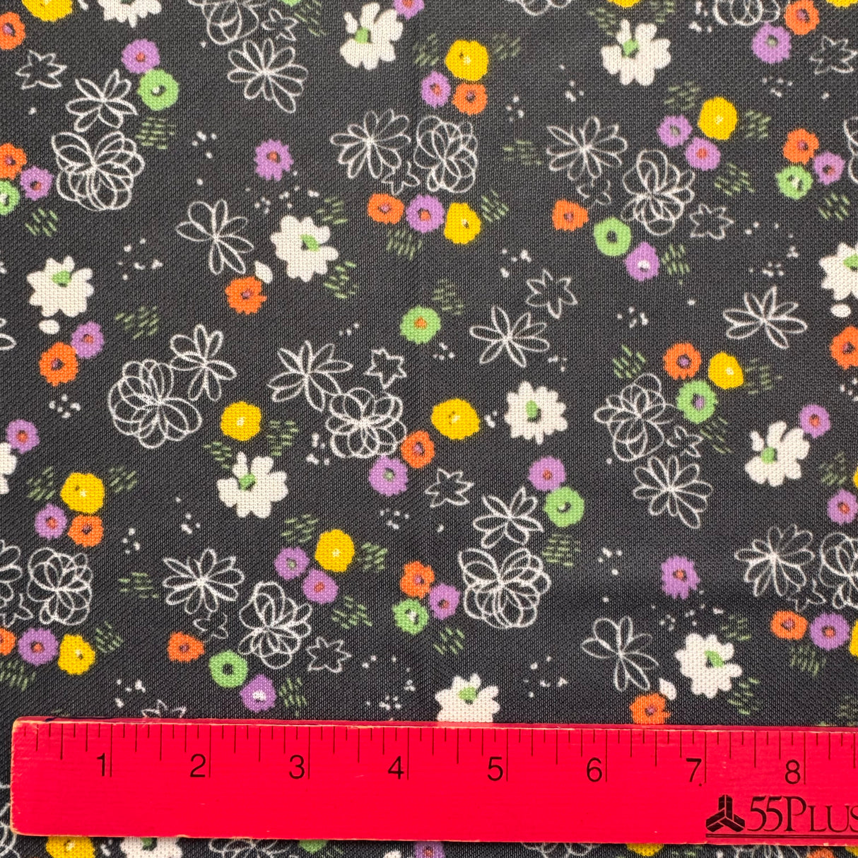 1970’s Black with multicolor flowers polyester fabric (P101)