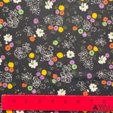 1970’s Black with multicolor flowers polyester fabric (P101)