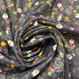 1970’s Black with multicolor flowers polyester fabric (P101)