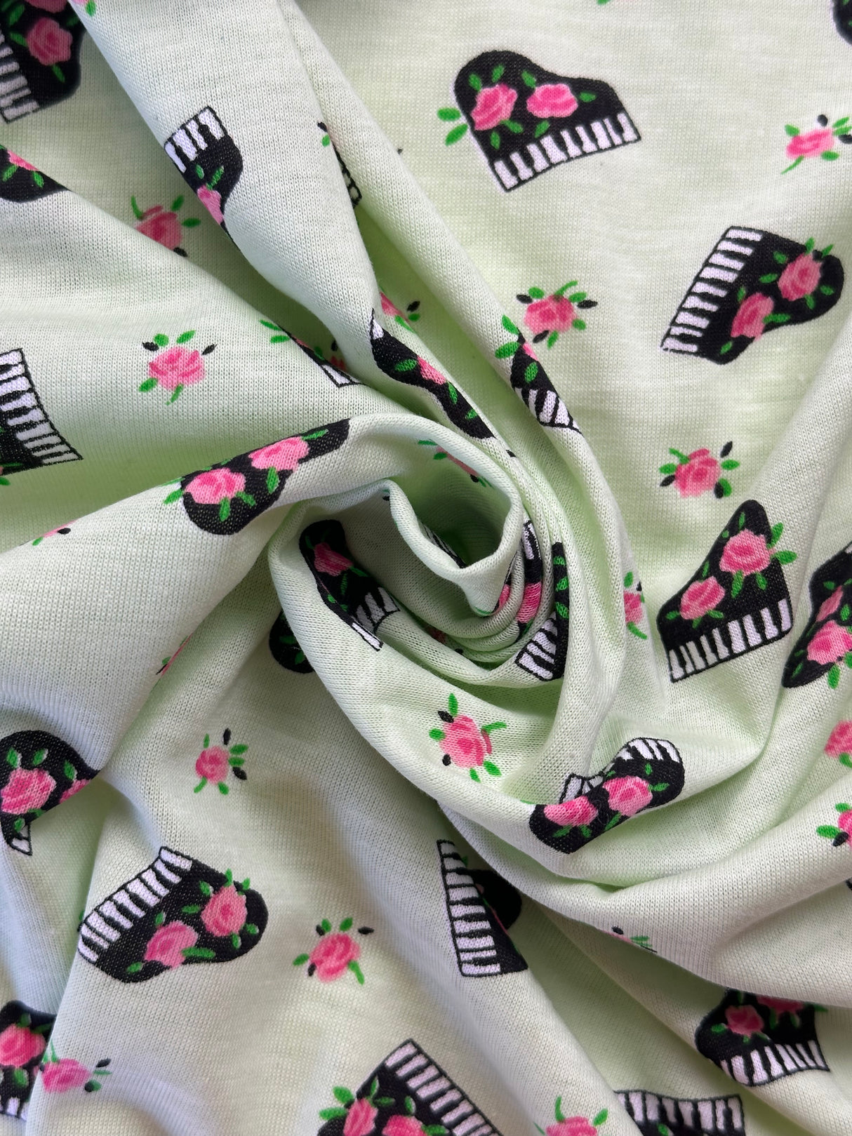 1990’s Pale Green Piano and Roses Novelty Print Cotton Jersey Knit Fabric - (P140)