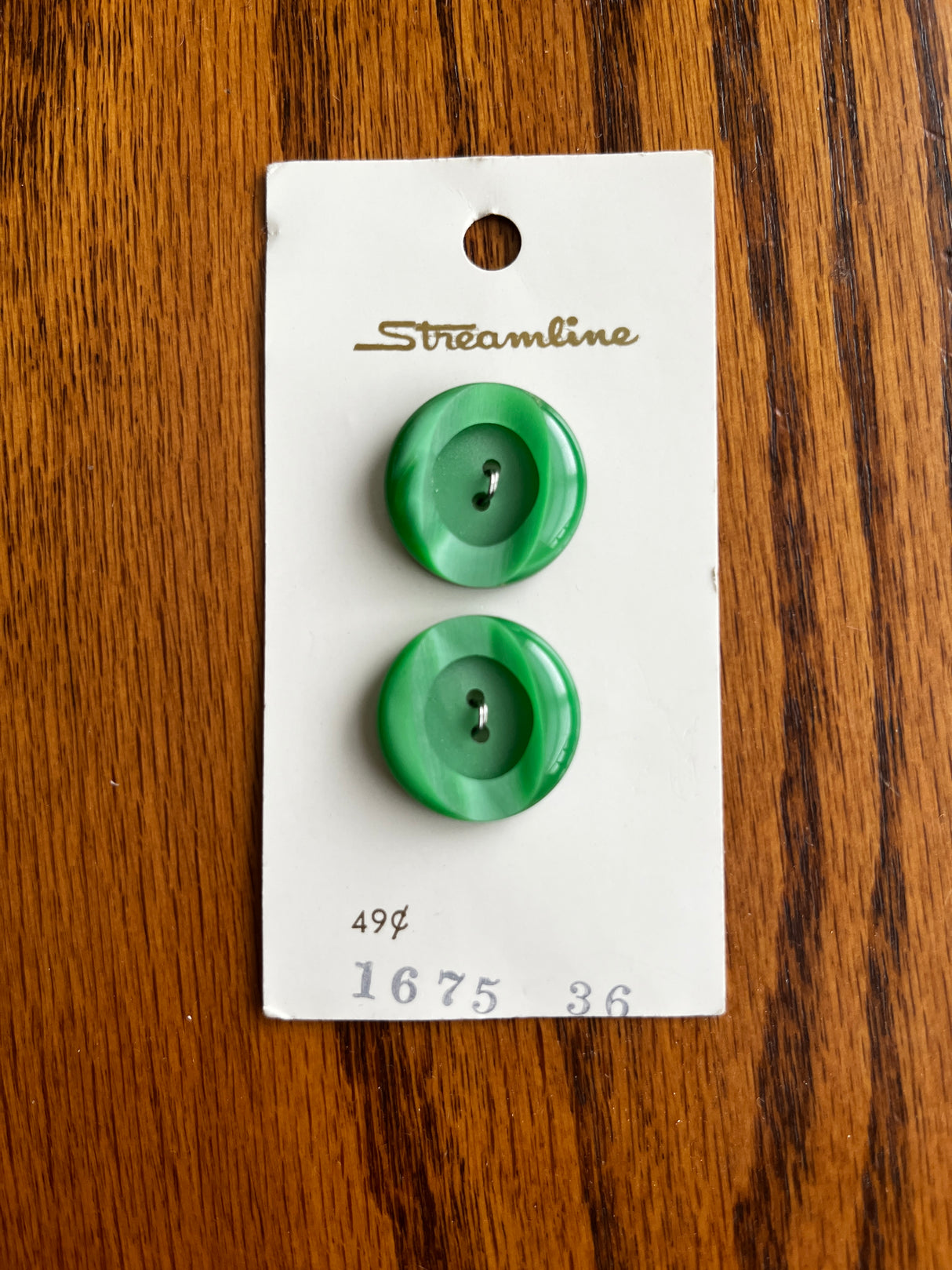 1970’s Streamline Green Carved Plastic Buttons - set of 2 - on card