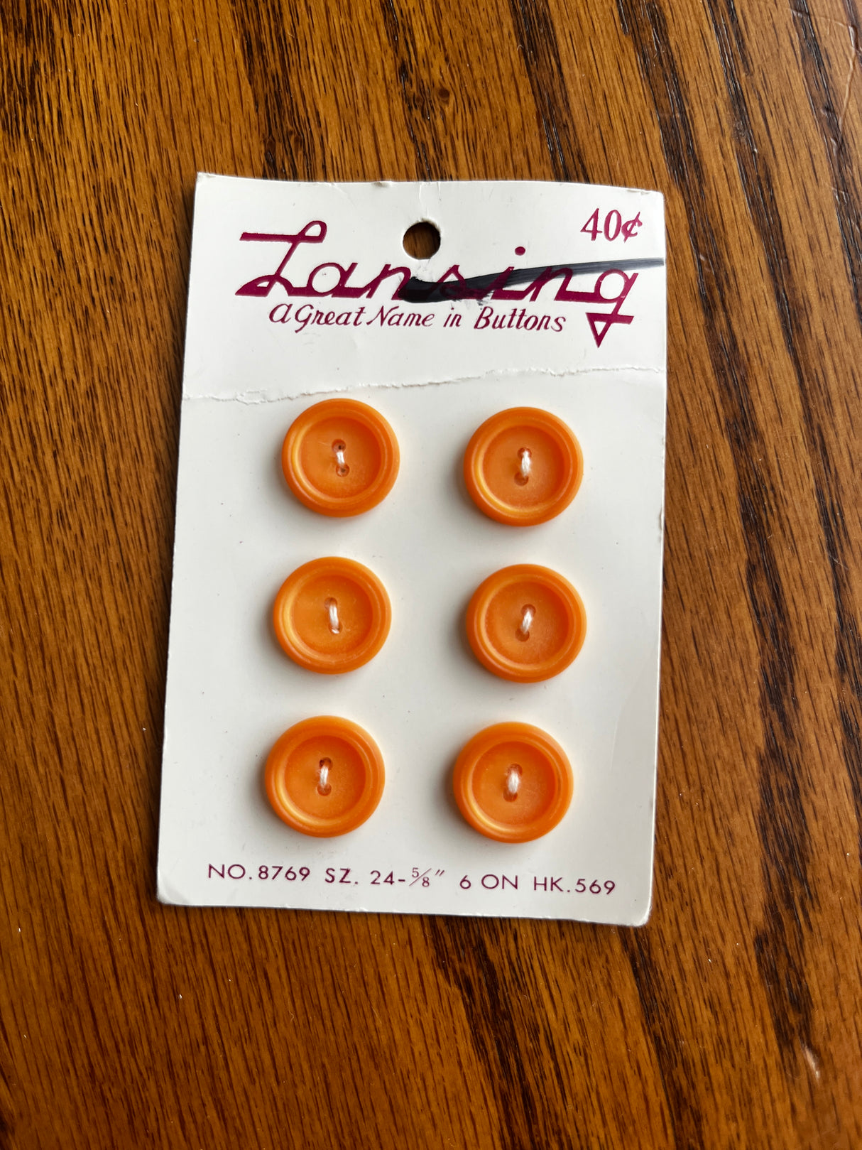 1970’s Lansing Light Orange Carved Plastic Buttons - set of 6 - on card
