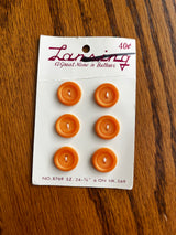 1970’s Lansing Light Orange Carved Plastic Buttons - set of 6 - on card
